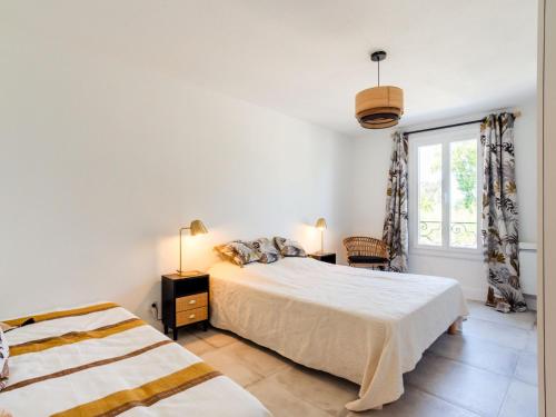 Postel nebo postele na pokoji v ubytování Apartment Rue de l'Amarrage by Interhome