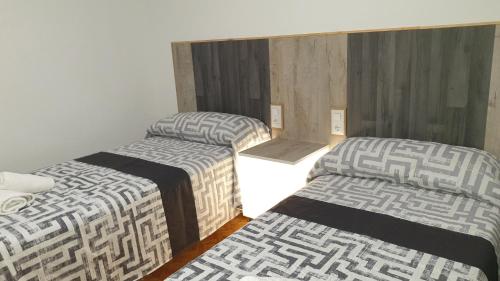 A bed or beds in a room at CHILLOUT LA RIOJA