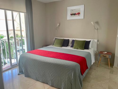 מיטה או מיטות בחדר ב-San Miguel B&B Granada