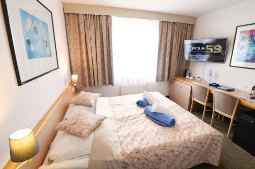 Katil atau katil-katil dalam bilik di Willa Posejdon - Aquapark Panorama Morska All Inclusive