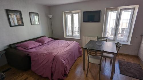 Postel nebo postele na pokoji v ubytování Myappartepinal