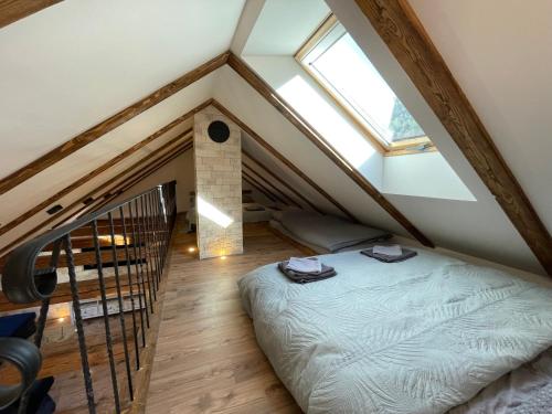 Voodi või voodid majutusasutuse Apartmány TIME toas
