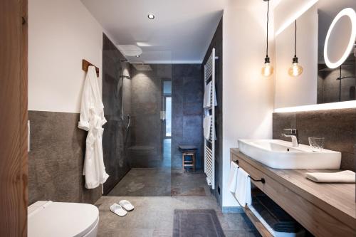 Koupelna v ubytování Oberfallerhof Apartment Aui