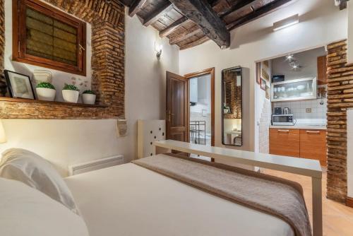 GuestHost - Heart of Trastevere Studio Flat