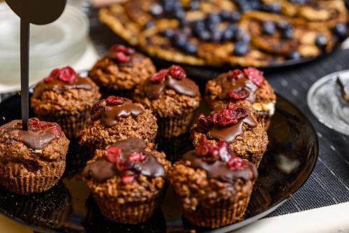 a plate of muffins with chocolate and cranberries at Ponte Porton Dining & lodging in Grožnjan