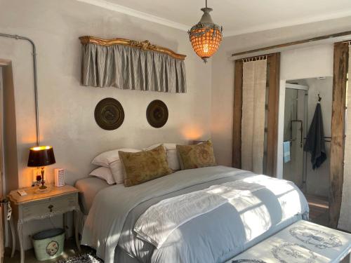 Postelja oz. postelje v sobi nastanitve The Karoo Moon House & Cottage