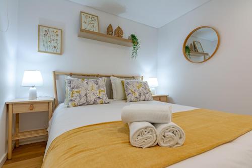 Postel nebo postele na pokoji v ubytování Casa de Sao Tiago 1