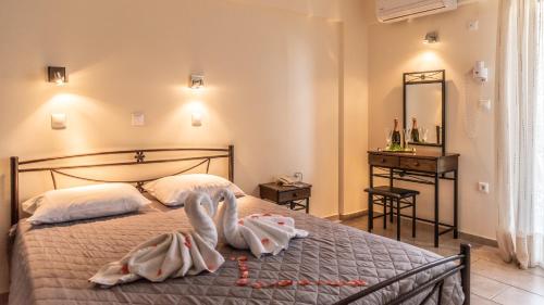 Кровать или кровати в номере Hotel Matina