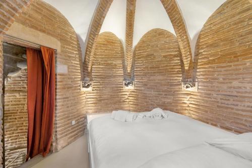 Posteľ alebo postele v izbe v ubytovaní La Tour du Capitole, cocoon insolite dans Toulouse