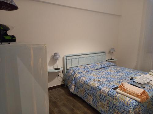Postel nebo postele na pokoji v ubytování DormireInCentro