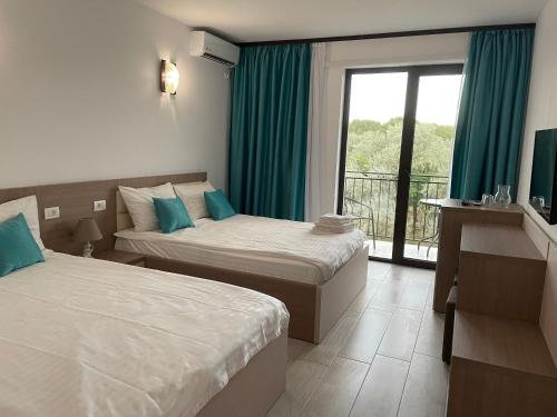 Llit o llits en una habitació de Casa Jasmin