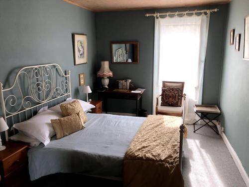 Katil atau katil-katil dalam bilik di Maison Verdeau