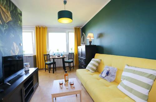 Televisyen dan/atau pusat hiburan di Apartament Stara Latarnia