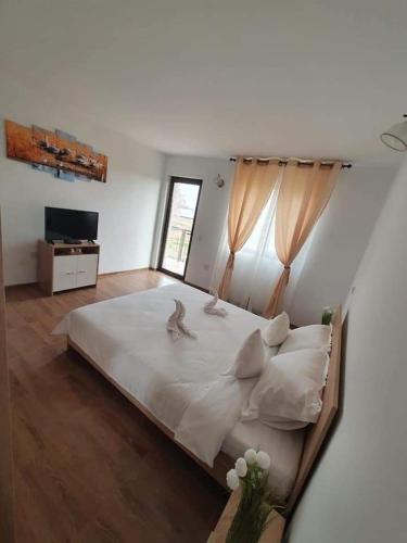 Llit o llits en una habitació de CASA RIZEA