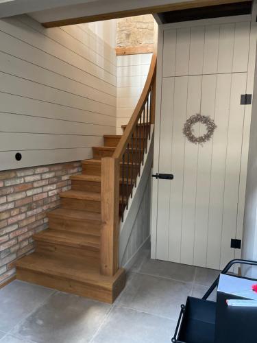 a staircase in a home with white walls at Lark in Schleibnitz