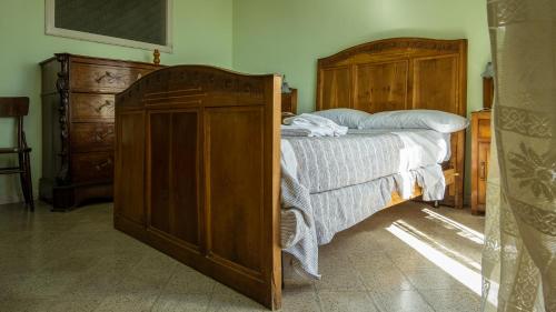 Postel nebo postele na pokoji v ubytování B&B Casa Baronale