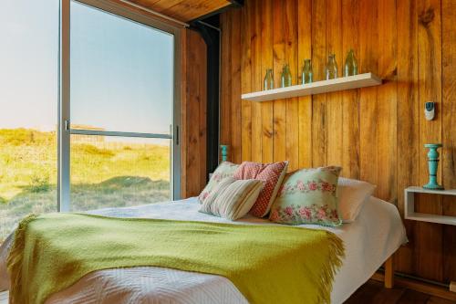 Katil atau katil-katil dalam bilik di Sand Wood Lofts