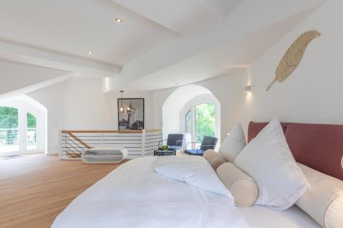 Postel nebo postele na pokoji v ubytování Husumer Wasserturm - Fewo 2