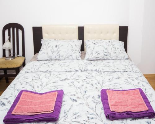 Кровать или кровати в номере SUPER CENTER - Apartment on "Kiril & Metodi" Square