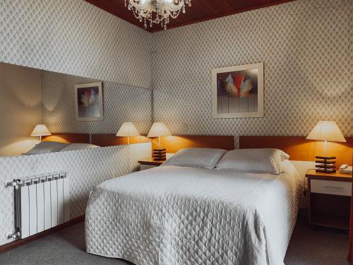 Katil atau katil-katil dalam bilik di Canto Belo Residenziale