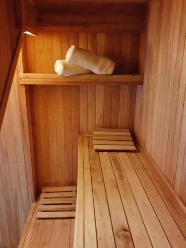 a inside of a sauna with a loaf of bread at Tamanacos Hotel & Spa in Villa Gesell