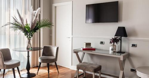 TV a/nebo společenská místnost v ubytování SeePort Hotel