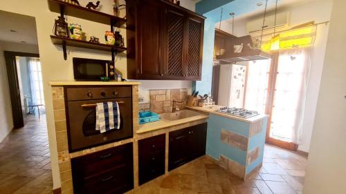 Η κουζίνα ή μικρή κουζίνα στο A Casa di Sasy