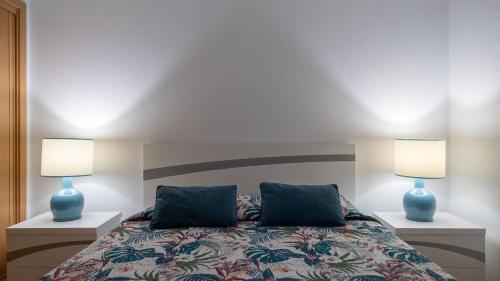 Кровать или кровати в номере Happy Home