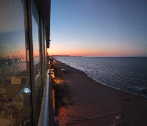 a view of the ocean from a cruise ship at SUNSET ROOM AT FRONT BEACH - HABITACION EN LA PLAYA en Piso compartido in Tavernes de Valldigna