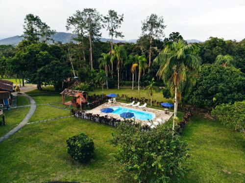 Pemandangan kolam renang di Casas Di Monte Ecopousada atau berdekatan