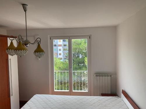 Postel nebo postele na pokoji v ubytování Maister Apartment Portoroz