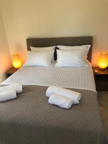 A bed or beds in a room at Venetia apartment