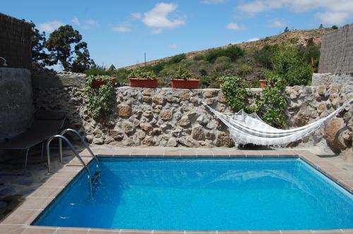 Piscina de la sau aproape de Casa rural las perez