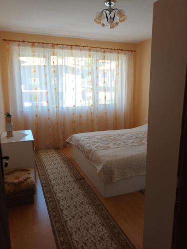 Ένα ή περισσότερα κρεβάτια σε δωμάτιο στο Dafni Apartment