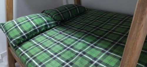 Letto o letti in una camera di JAMES & GOMEZ SOCIETY