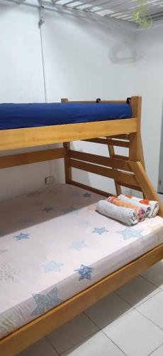 Letto o letti in una camera di JAMES & GOMEZ SOCIETY
