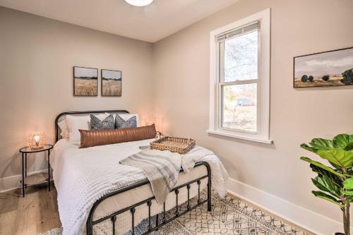 a bedroom with a bed and a window at Sunny Superior Home - Swim, Hike, and Explore! in Superior