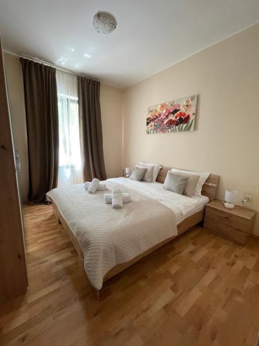 Posteľ alebo postele v izbe v ubytovaní Apartment Vista Kali
