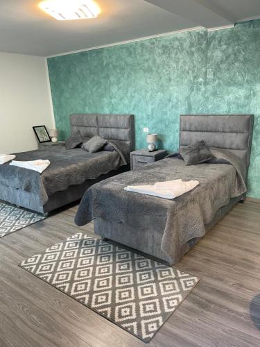 Llit o llits en una habitació de CASA PARASCHIVA