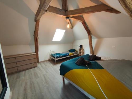 Кровать или кровати в номере Les capucines ,proche Beauval & châteaux de la Loire