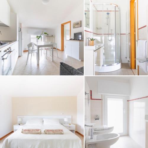 a kitchen and a bedroom with a bed and a bathroom at Residence Hotel Le Stelle in Rimini