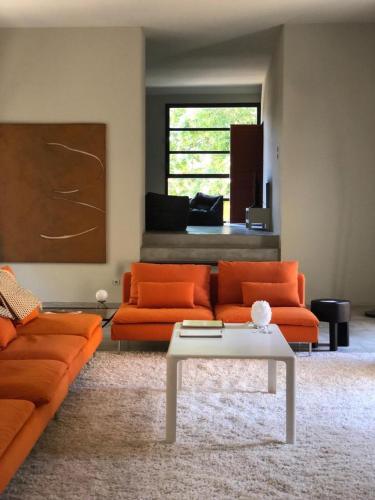 Posezení v ubytování Maison au coeur d'un vignoble