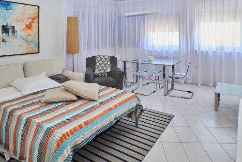 Postel nebo postele na pokoji v ubytování NOVIGRAD BOUTIQUE APARTMENT