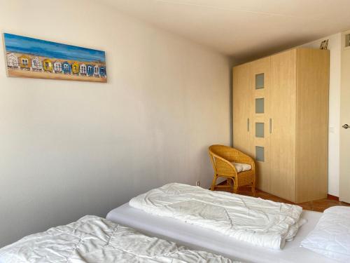 Postel nebo postele na pokoji v ubytování Callantsoger Staete A112