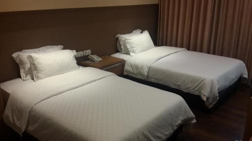 Cama o camas de una habitación en Dago 207