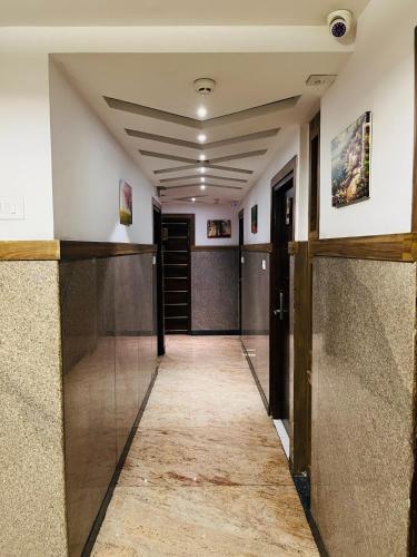 a corridor of a building with at The Porch Inn Hotel/Service Apartments in Bengaluru