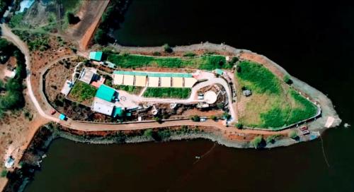 an aerial view of an island in the water at Prime Neelkanth Forest Retreat Resort in Tehla