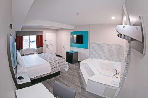 En eller flere senge i et værelse på Rodeway Inn South Gate - Los Angeles South