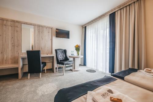 Grand Tatry - miejsce na wyjątkowy pobyt dla Ciebie i Twojej rodziny! - sauna i jacuzzi wliczone w cenę pobytu - 10 minut pieszo od Term Baniaにあるベッド