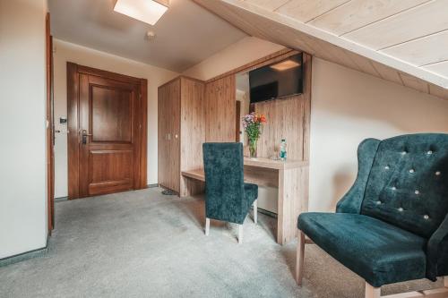 Grand Tatry - miejsce na wyjątkowy pobyt dla Ciebie i Twojej rodziny! - sauna i jacuzzi wliczone w cenę pobytu - 10 minut pieszo od Term Baniaにあるテレビまたはエンターテインメントセンター